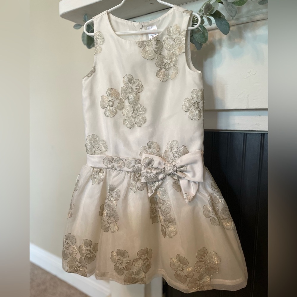 White dress with gold embroidery
